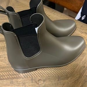 Green rain boots worn once